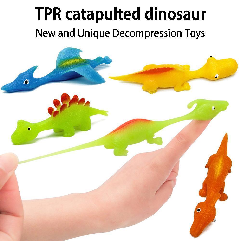 Steinschleuder Dino-Katapult Fingerspielzeuge